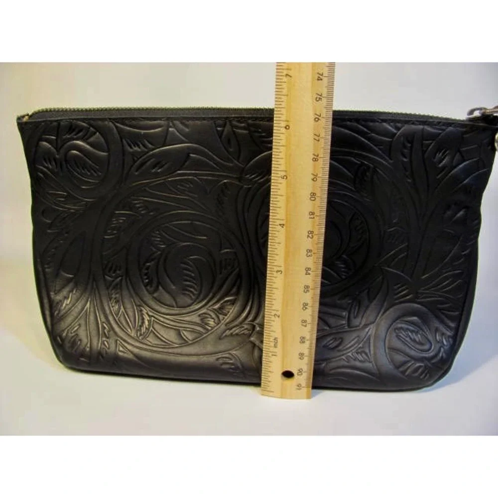 The Sak Cosmetic Clutch Embossed Black Like New